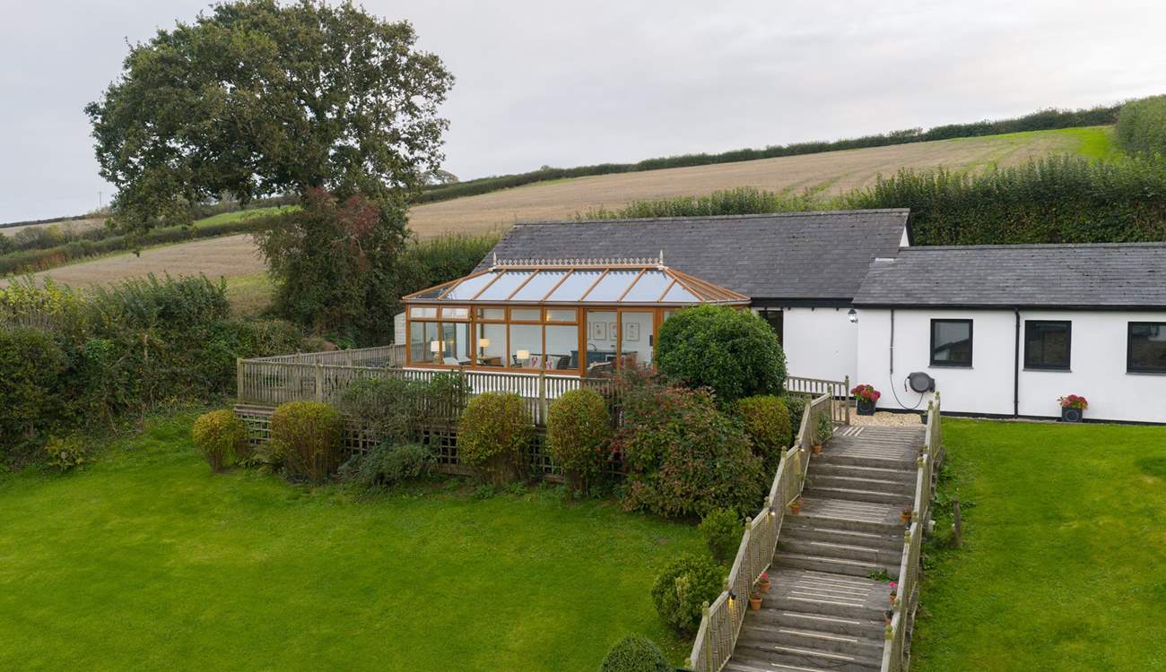 Take the steps up to the swimming pool and games-room.