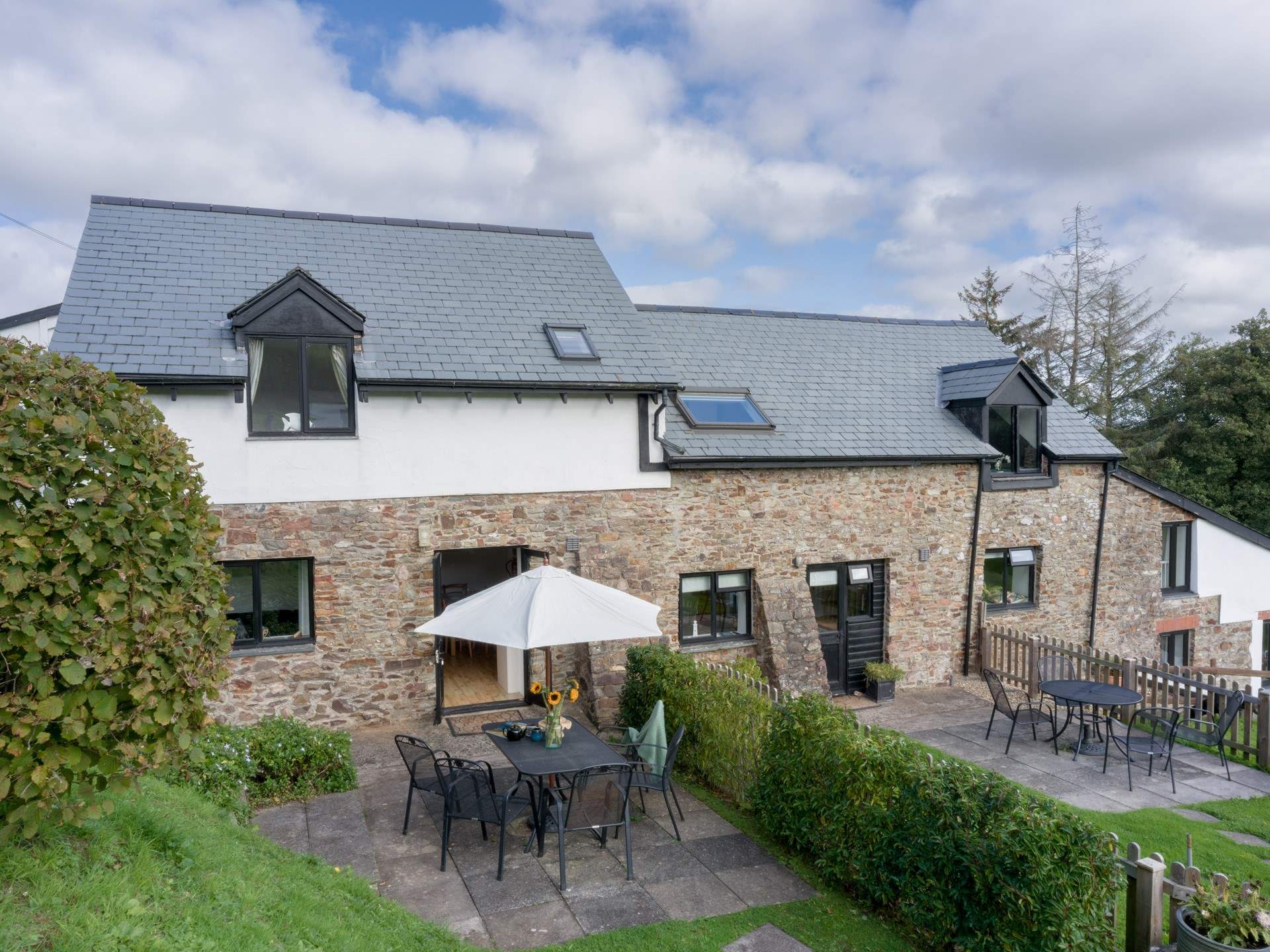 From the back garden walk across to the shared swimming pool for a spot of family fun.