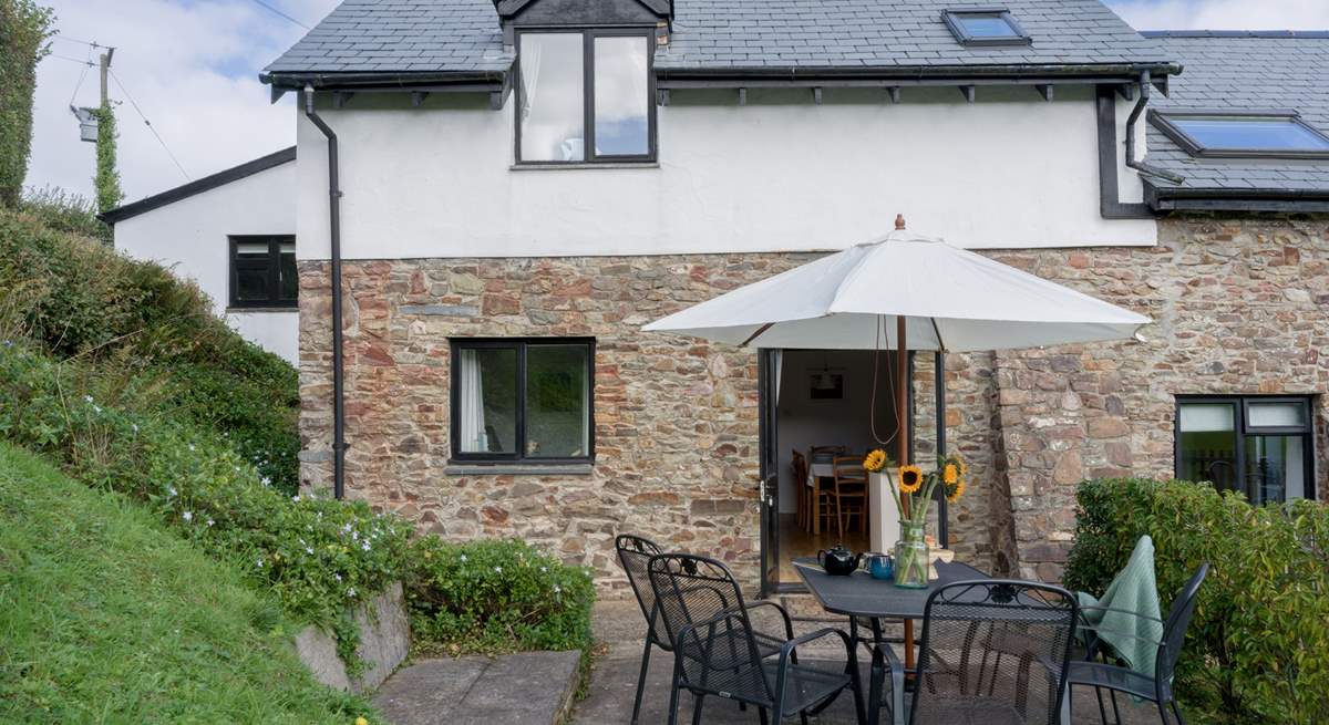 Enjoy a spot of al fresco dining following your warm welcome at Heron Cottage.