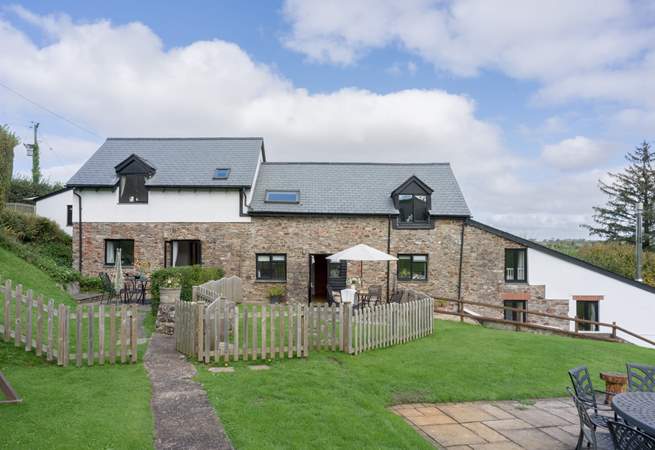 Head out of the gate and follow the path to the swimming pool and shared games-room.