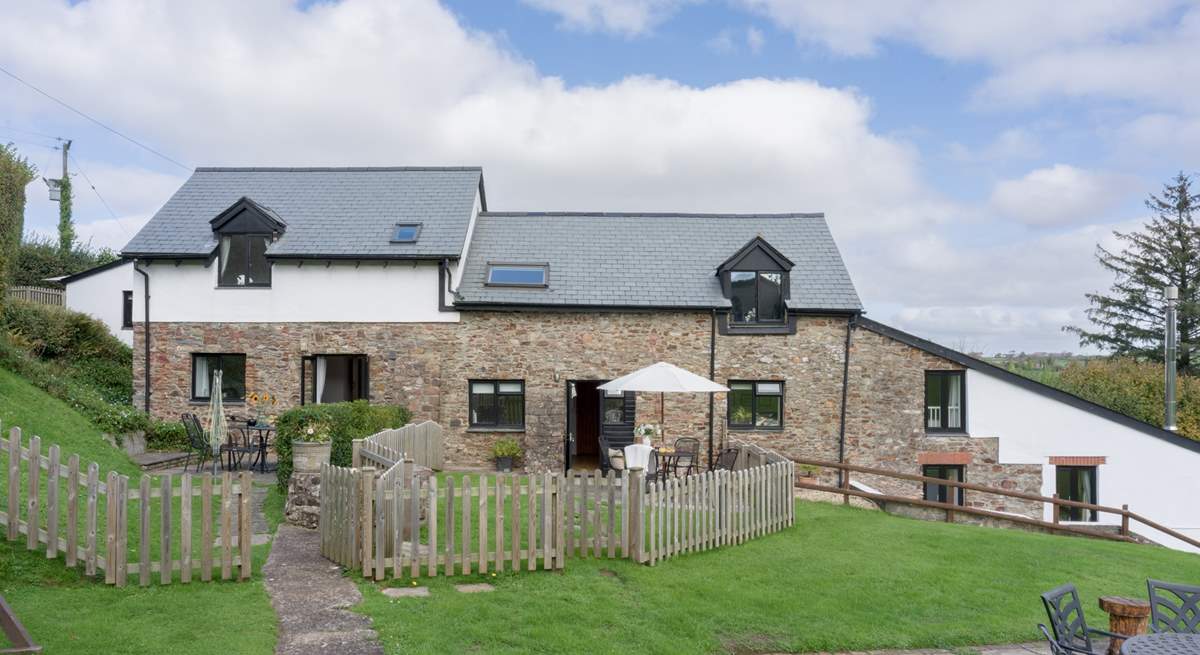 Head out of the gate and follow the path to the swimming pool and shared games-room.