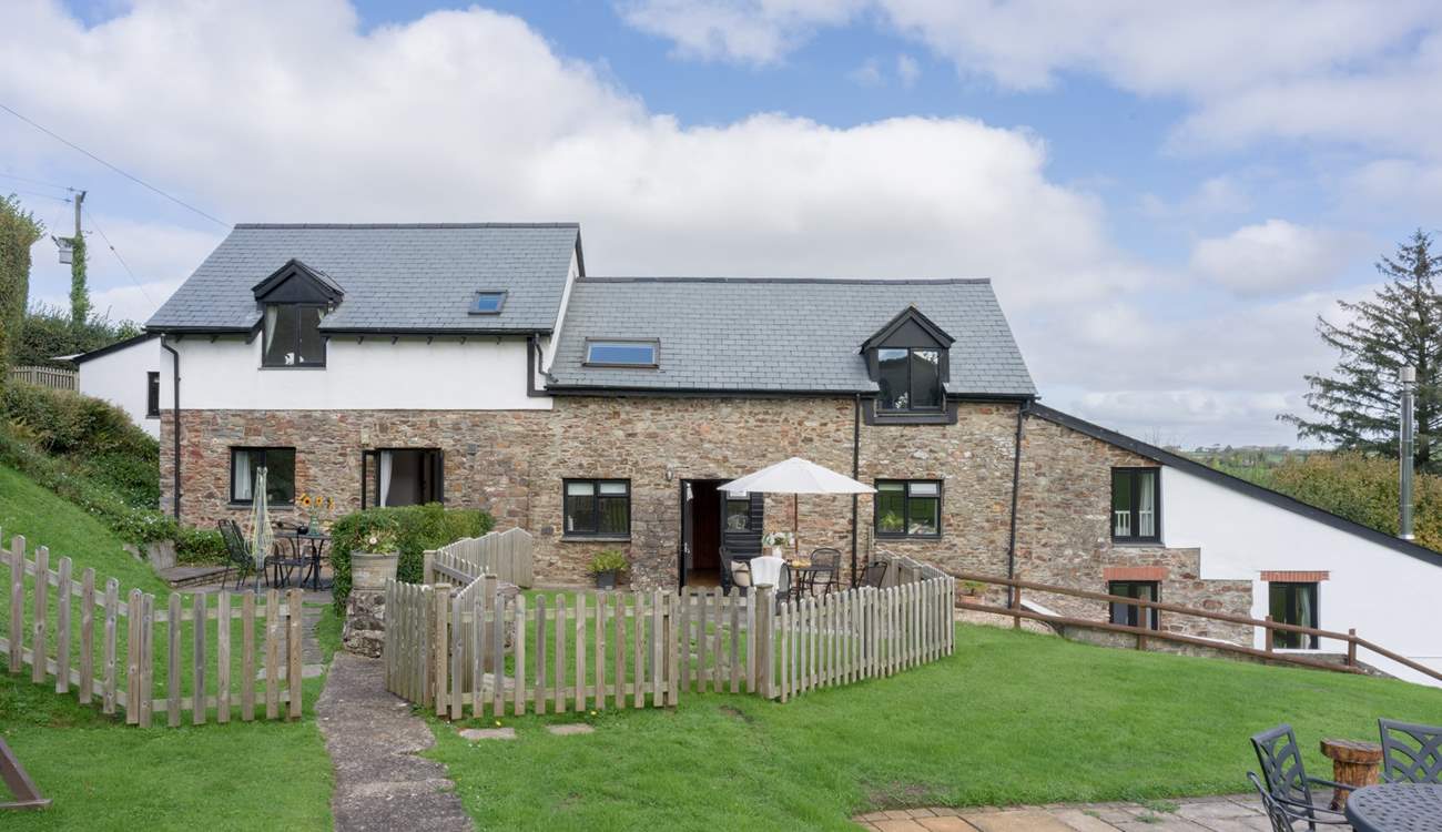 Head out of the gate and follow the path to the swimming pool and shared games-room.