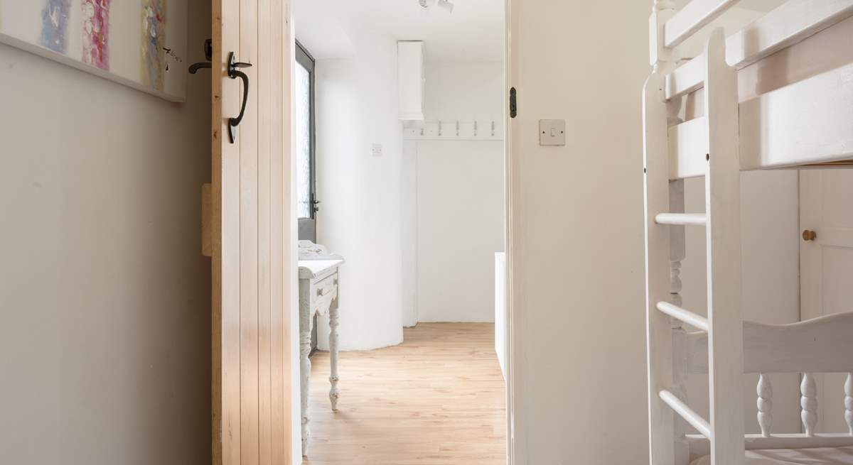 The bunk bedroom can be found on the ground floor.