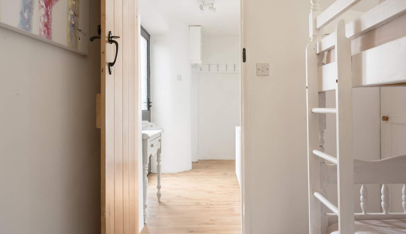 The bunk bedroom can be found on the ground floor.