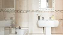 Take a leisurely soak or a refreshing shower in the family bathroom.