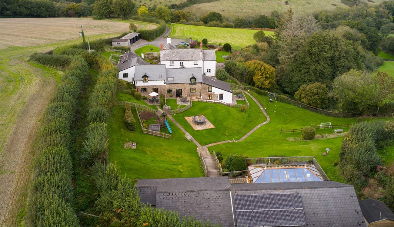 Welcome to Heron Cottage - your garden is the one with the white umbrella. Simply walk out of the back door, across the communal garden and enjoy a leisurely swim.