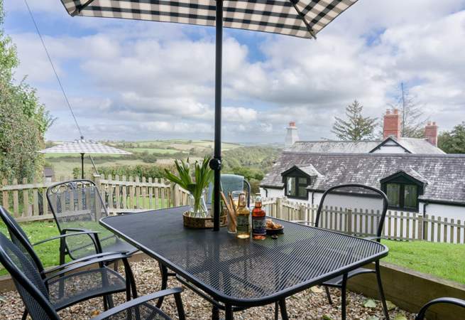 Welcome to Puffin Cottage.  The seating area at the top of the garden makes the most of the wonderful views.