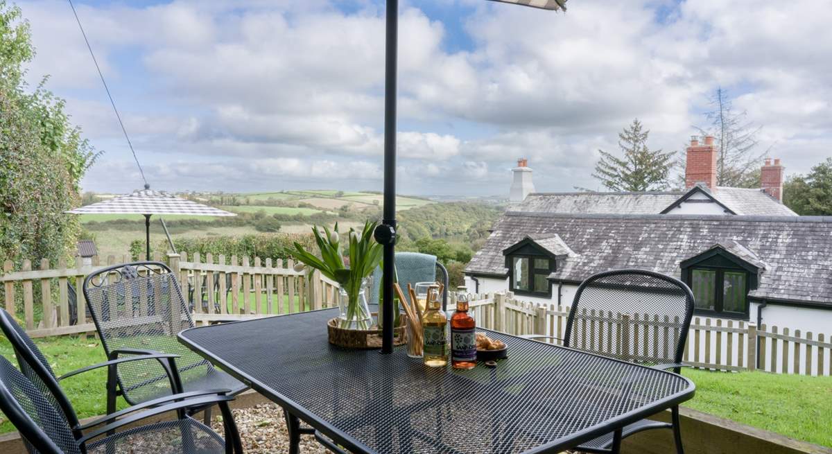 The seating area at the top of the garden makes the most of the wonderful views.