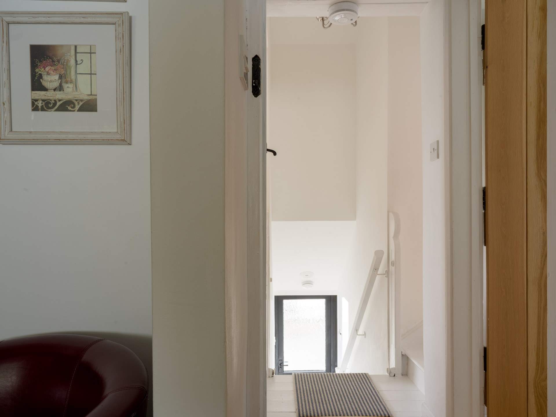 Head out on to the small landing to discover two bedrooms. 