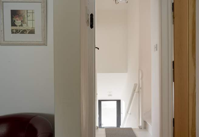 Head out on to the small landing to discover two bedrooms. 