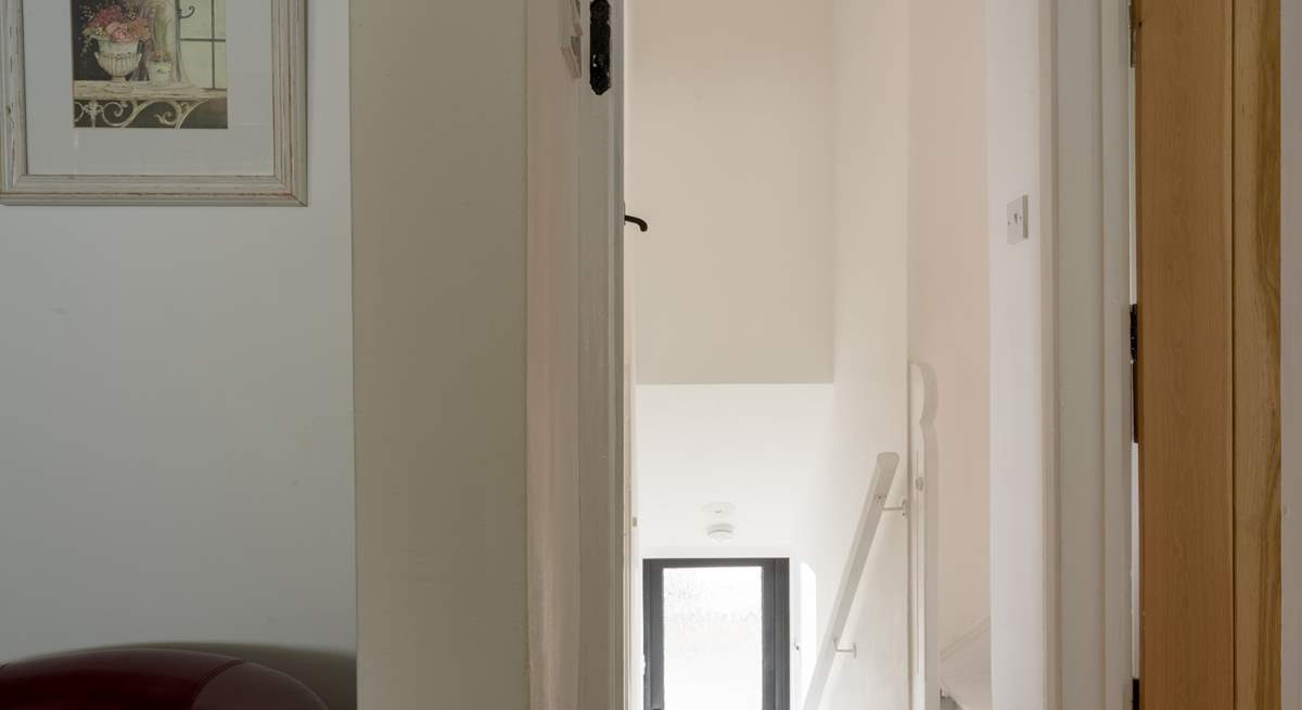 Head out on to the small landing to discover two bedrooms. 