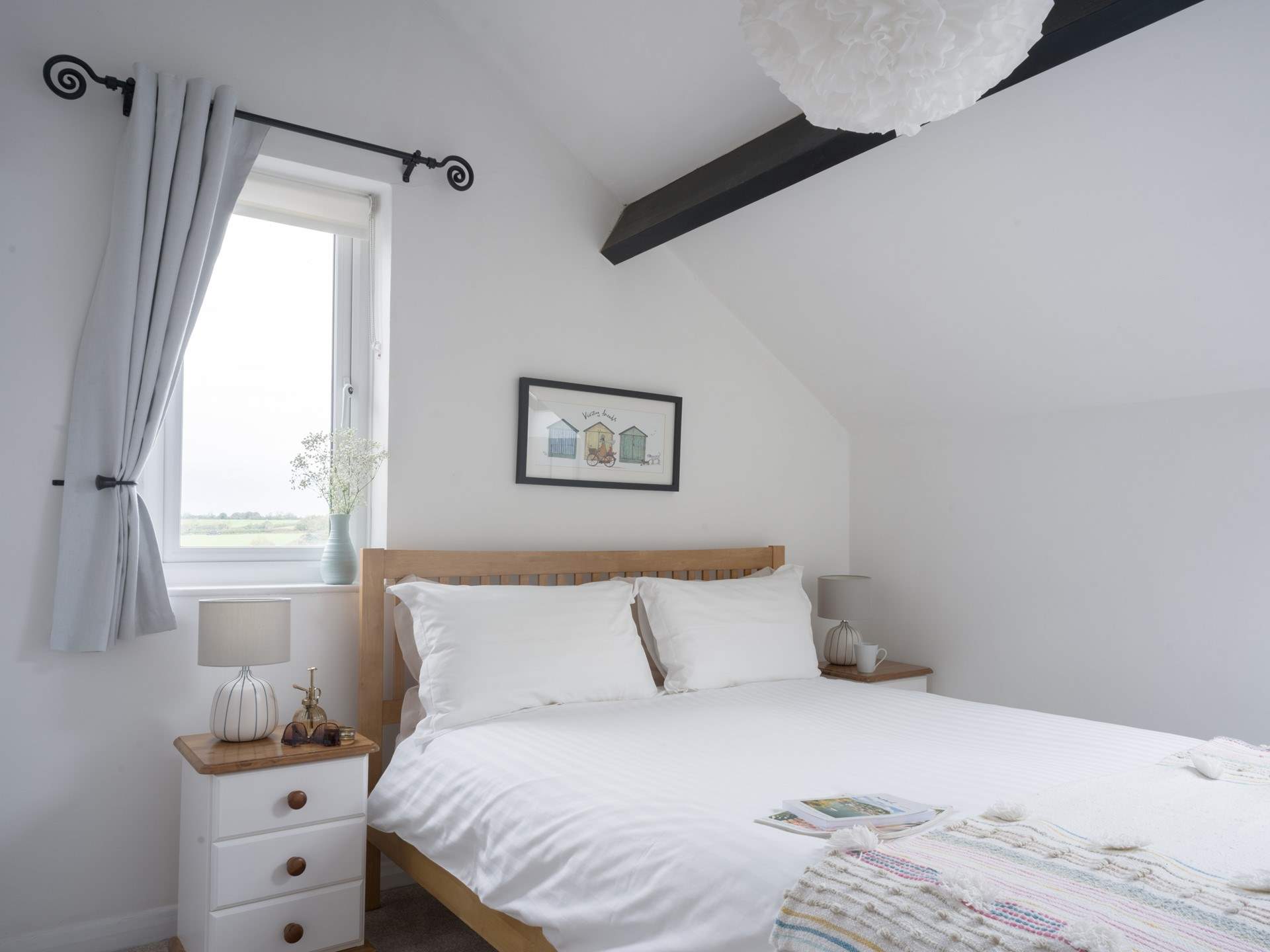 Bedroom 2 has a king-size bed and countryside views as far as the eye can see.