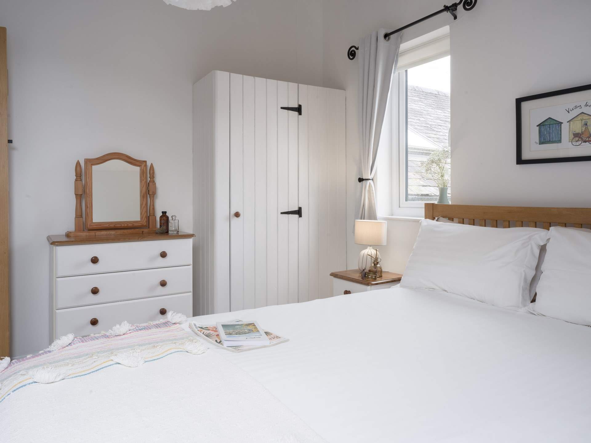 This calming bedroom offers the best spot to recharge at the end of each day.