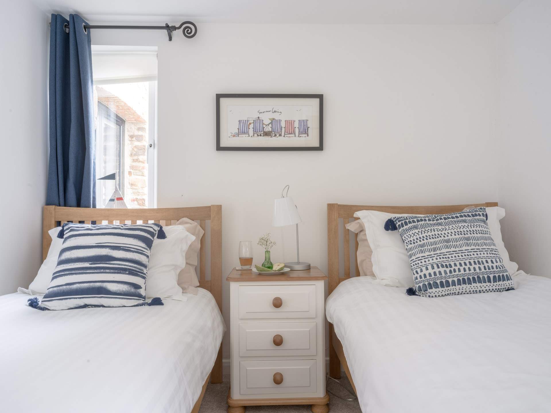 The oh so pretty twin bedroom can be found on the ground floor along with the family bathroom.