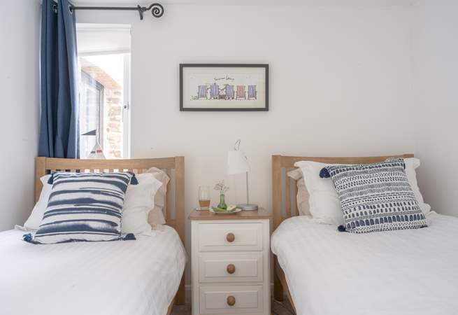The oh so pretty twin bedroom can be found on the ground floor along with the family bathroom.