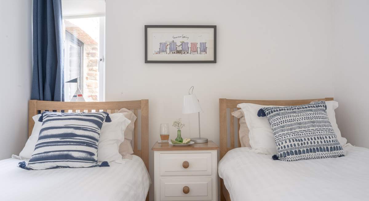 The oh so pretty twin bedroom can be found on the ground floor along with the family bathroom.