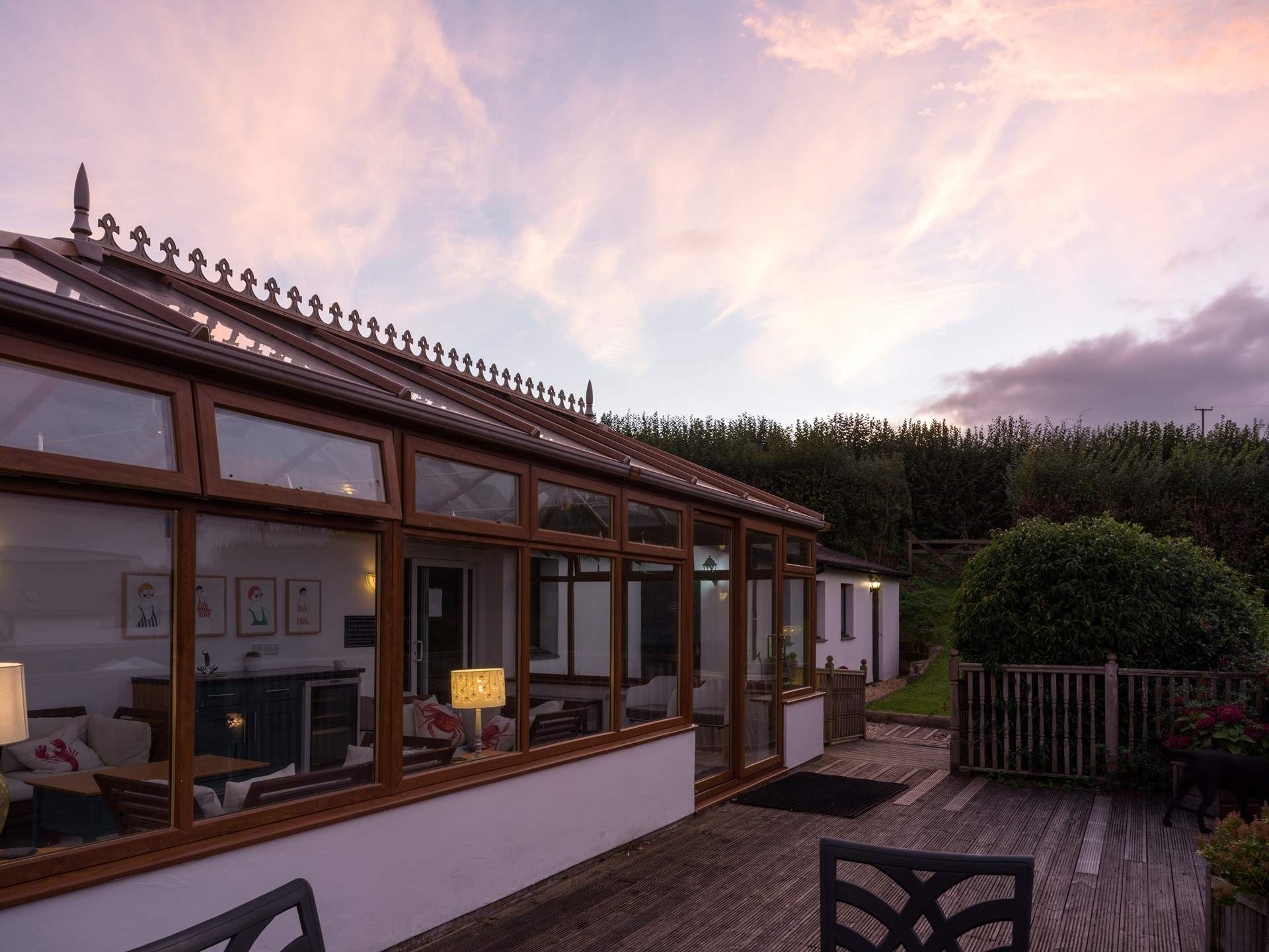 The shared conservatory provides another place to relax and chill. The entrance to the pool is through the conservatory.