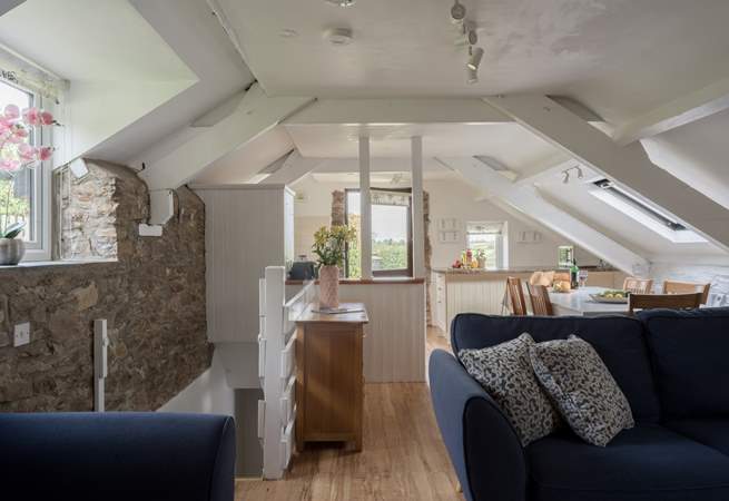 With original stonework and beams the open plan area is full of character.