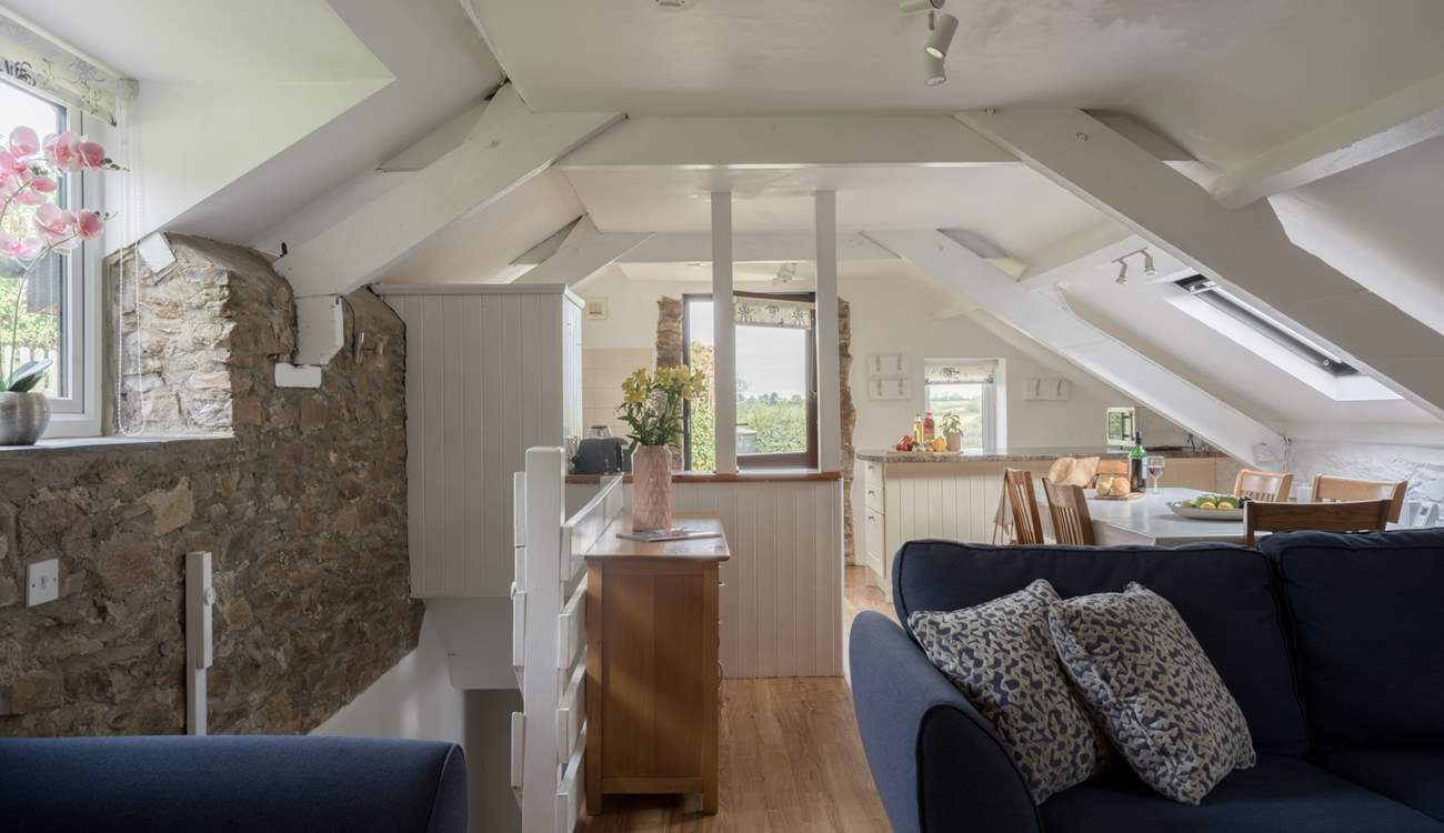 With original stonework and beams the open plan area is full of character.