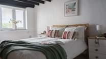 After a busy day exploring you'll be ready to snuggle down in this comfy double bed in bedroom 1.