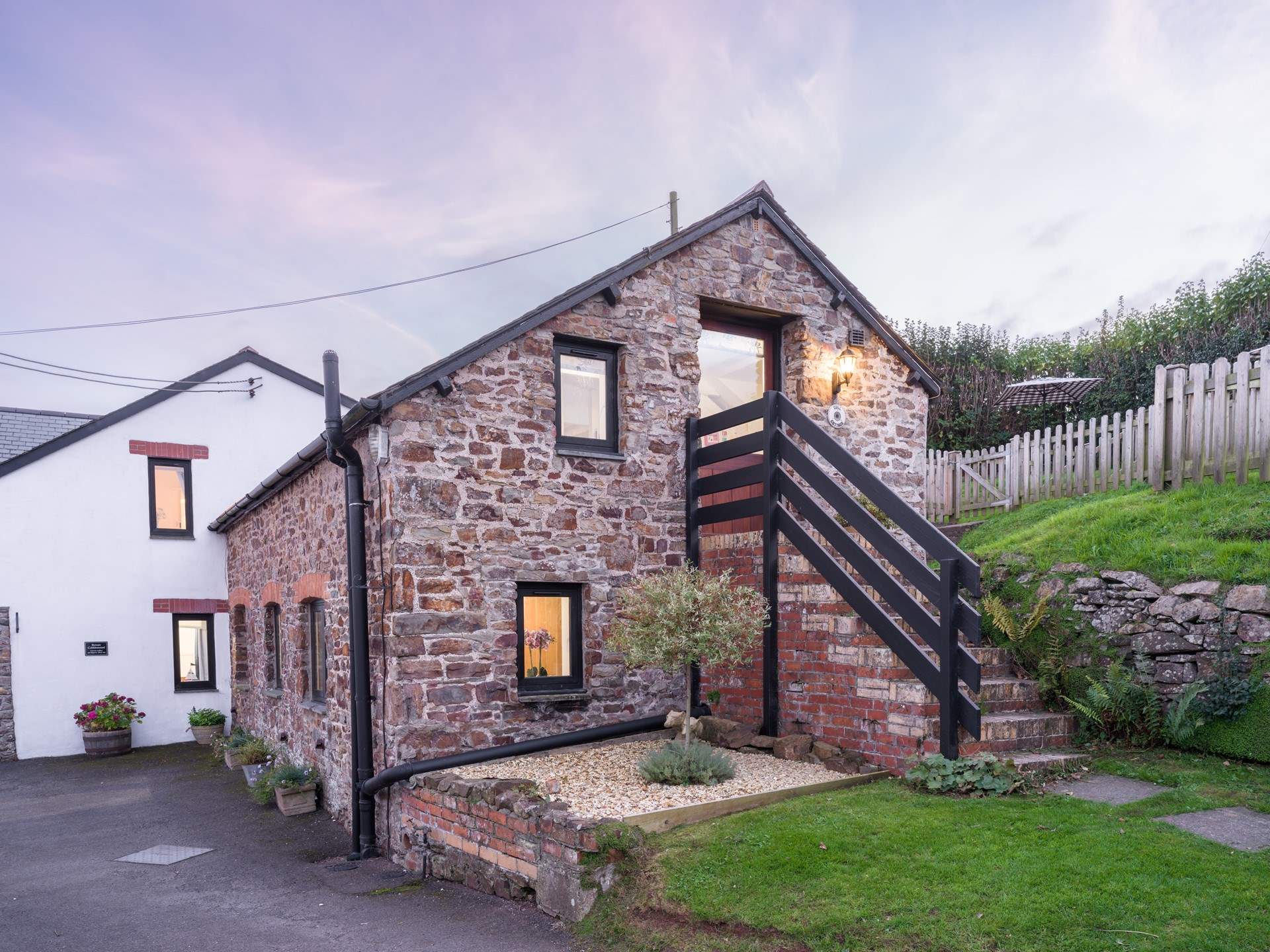 Head up the steps to Gull Cottage.