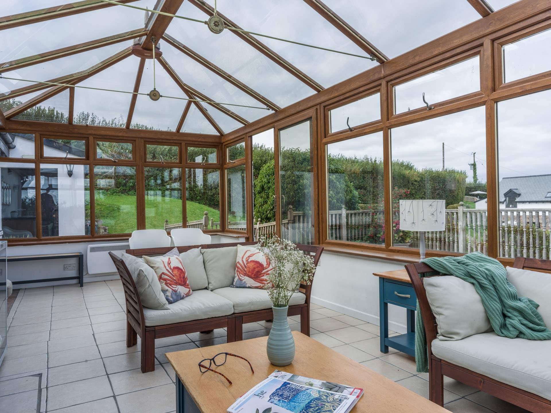 The grandparents can relax in the shared conservatory whilst the parents and children enjoy the pool.