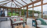 The grandparents can relax in the shared conservatory whilst the parents and children enjoy the pool. - Thumbnail Image