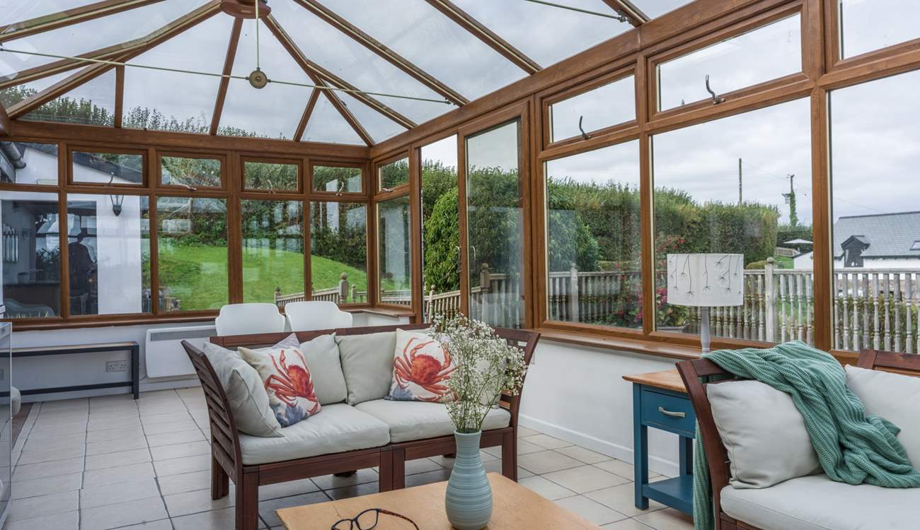 The grandparents can relax in the shared conservatory whilst the parents and children enjoy the pool.