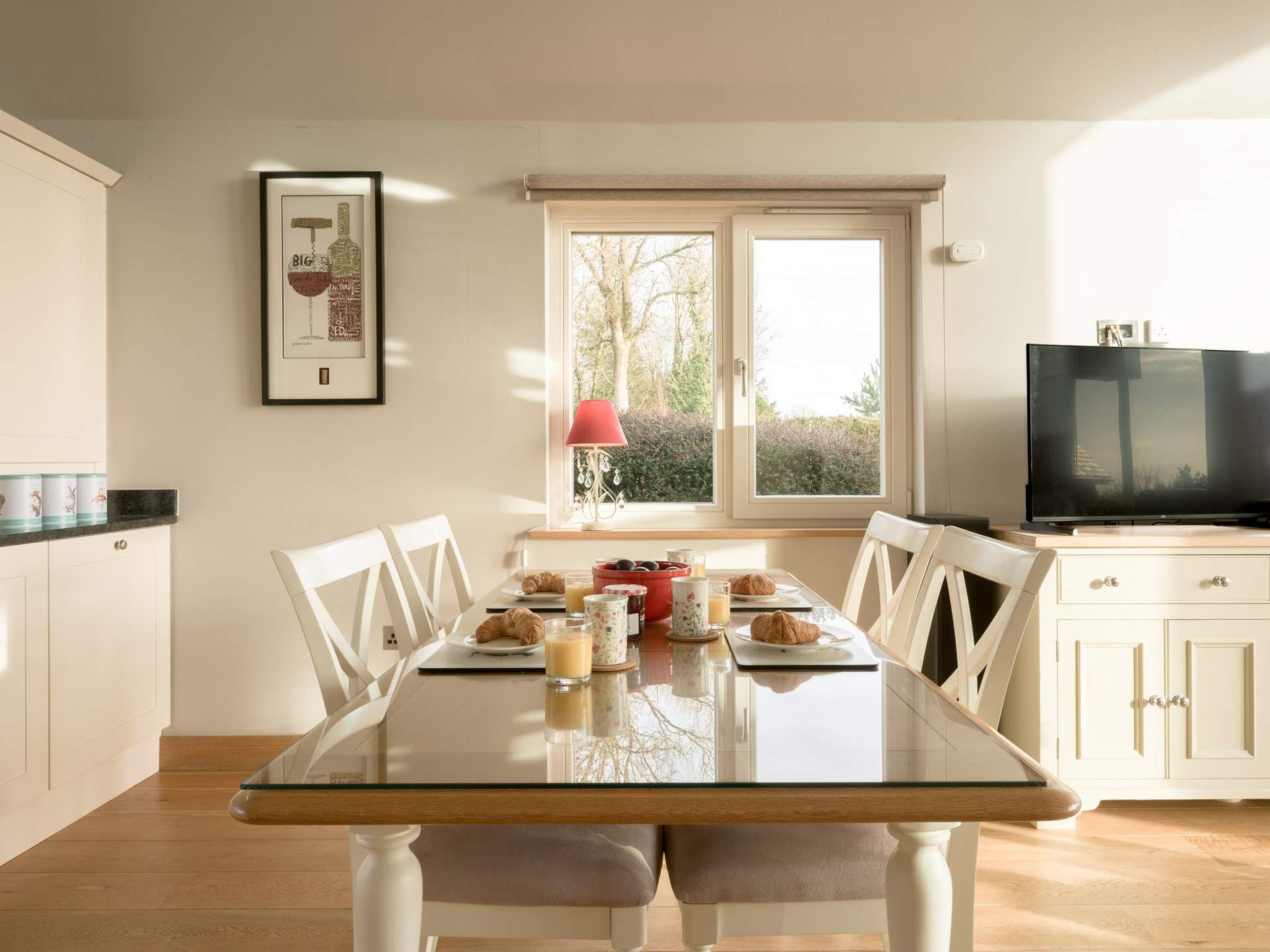 The large dining-table is a perfect spot for a bit of lazy brunch with the papers.