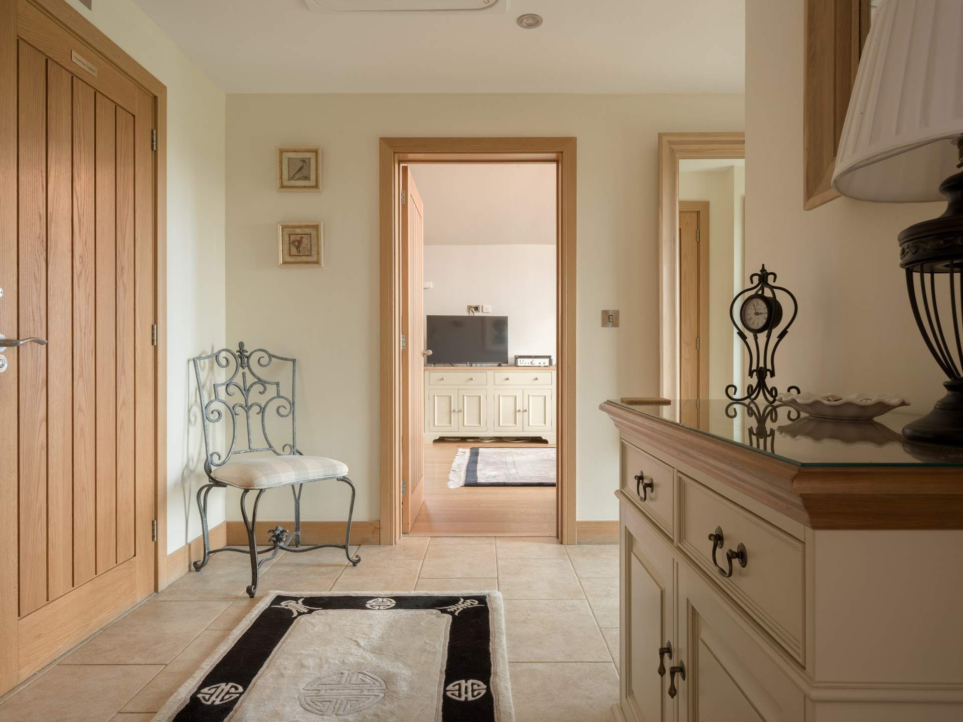 Heading out of the living-room you will find two beautiful en suite bedrooms off the main hallway.