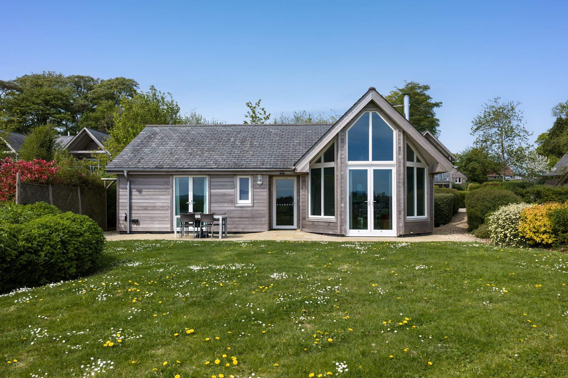 Welcome to the spectacular The Cygnet - Lodge 11. A purpose-built luxury Scandinavian style holiday home set in the most glorious sylvan surroundings on the famous Cricket St Thomas estate.