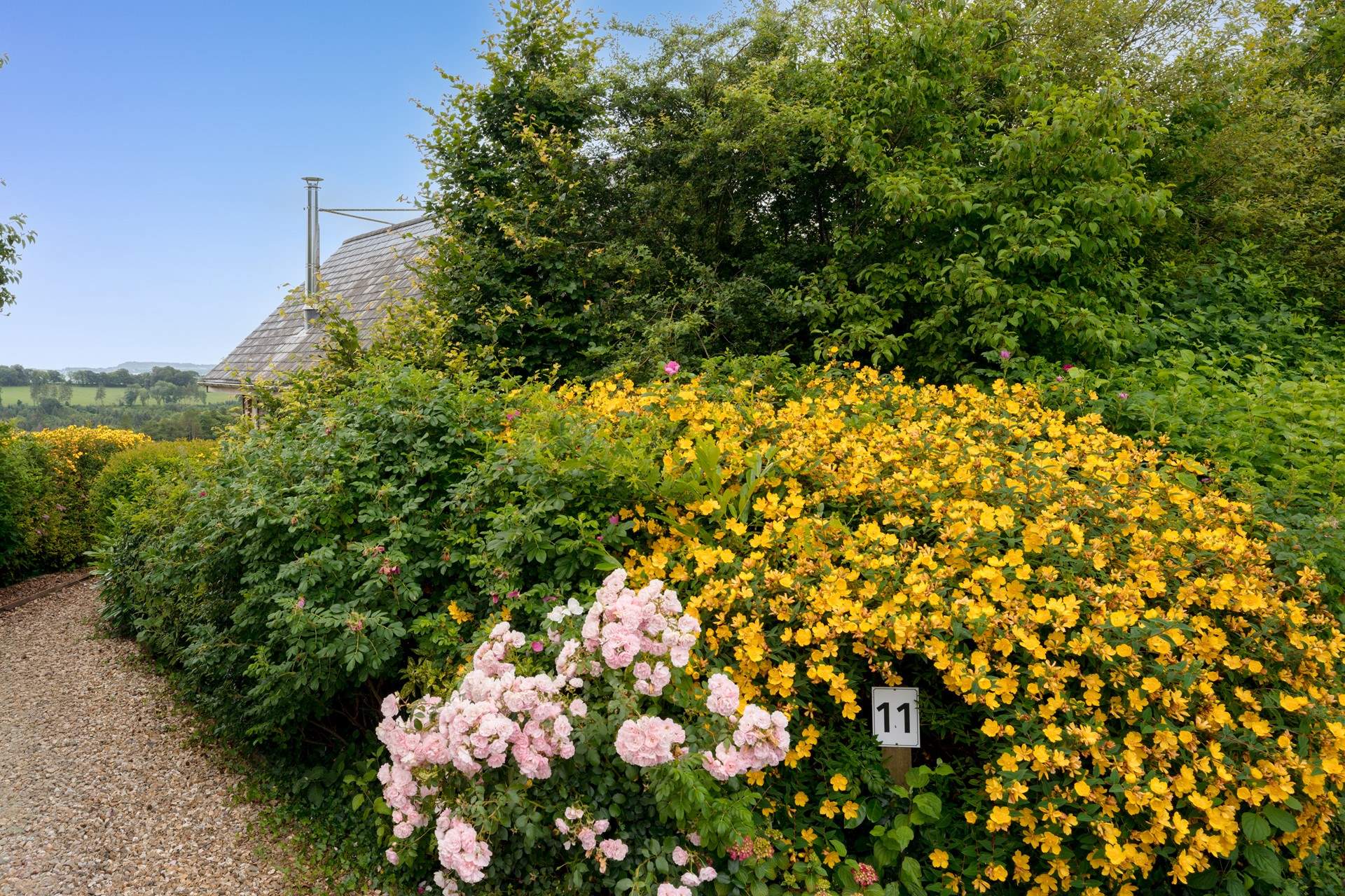 The colourful landscaping around the lodge really does compliment the panoramic rural views.