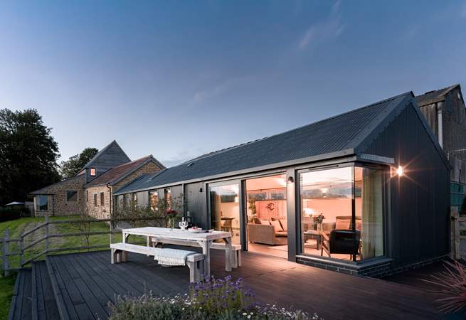 As evening falls the indoor-outdoor living comes into its own.