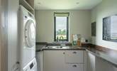 The ever useful separate utility-room has a washing machine and tumble-drier. - Thumbnail Image