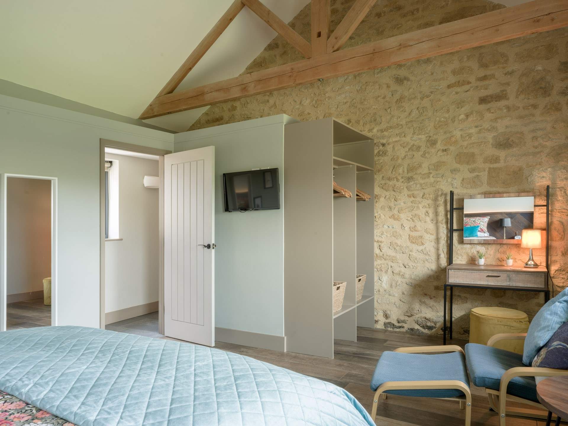 Storage and hanging space galore as well as a spot to sit and read.