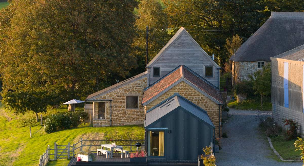 Hood's has its own private enclosed garden as well as further grounds to explore. Just over the top you can see the sister property - Loaf, also available to book.