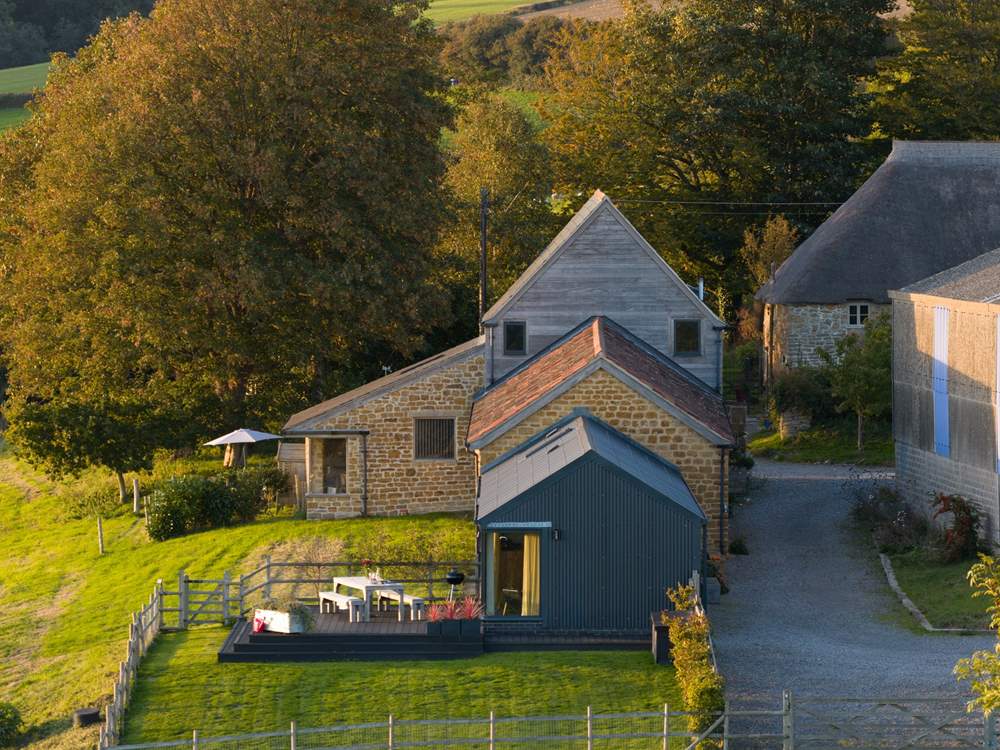Hoods has its own private enclosed garden as well as further grounds to explore. Just over the top you can see the sister property - Loaf, also available to book.
