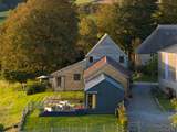 Hoods has its own private enclosed garden as well as further grounds to explore. Just over the top you can see the sister property - Loaf, also available to book.