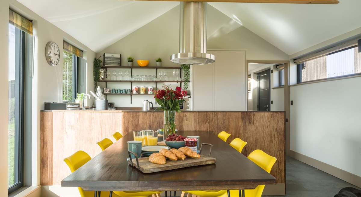 The stunning vaulted open plan living space is perfect for group get togethers or couples' getaways.