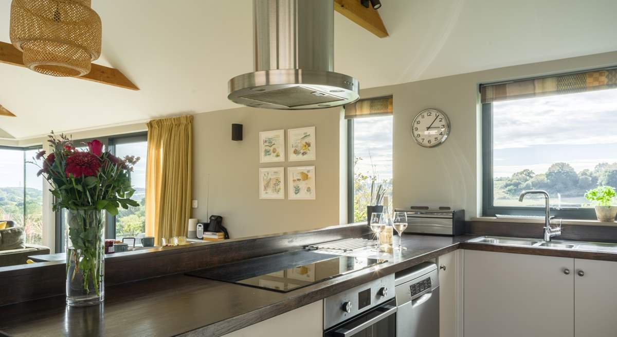 The kitchen is fully equipped and makes for a wonderful social dining environment