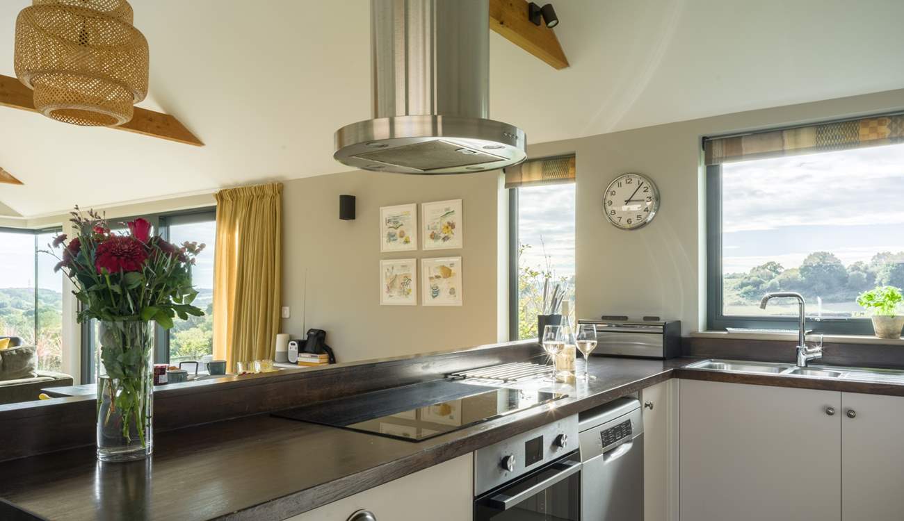 The kitchen is fully equipped and makes for a wonderful social dining environment