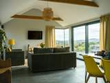 The views from the living area are quite something and the French doors really let the outside in.