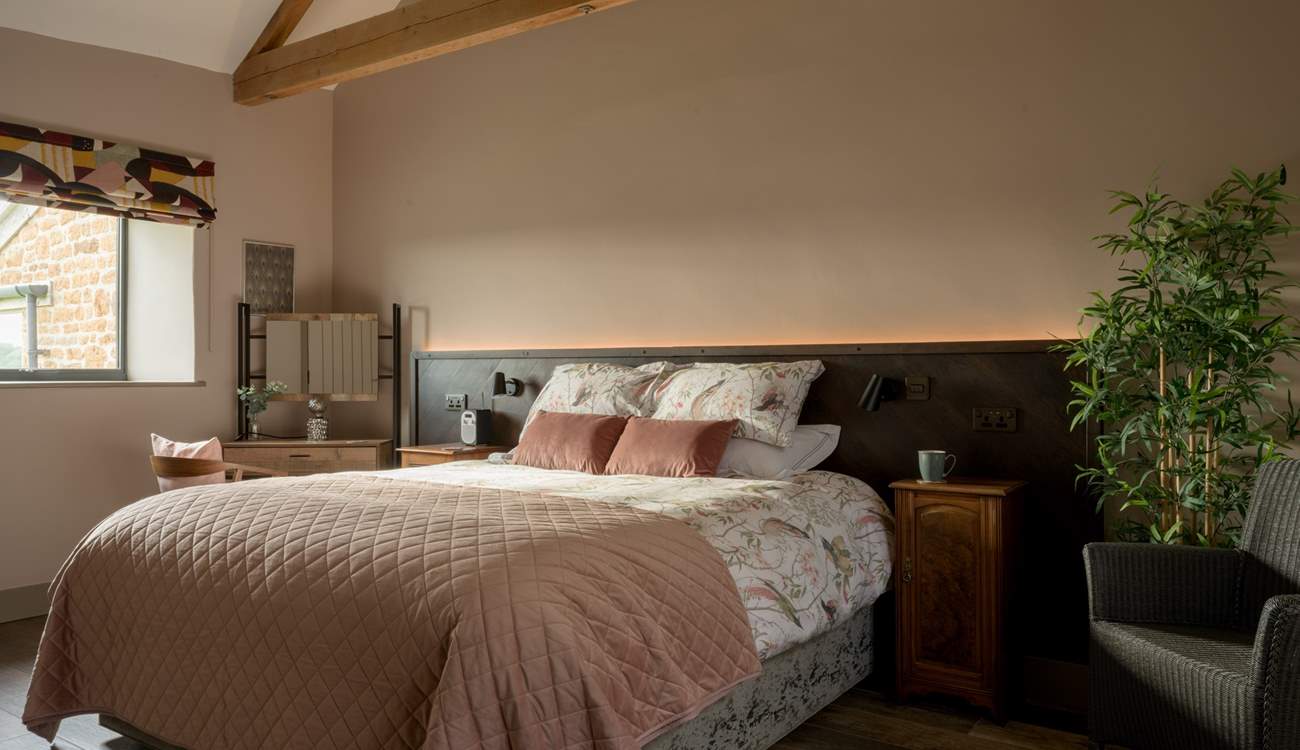 The primary bedroom is serene with a super-king size bed (can be split into two twins) and luxurious linen.
