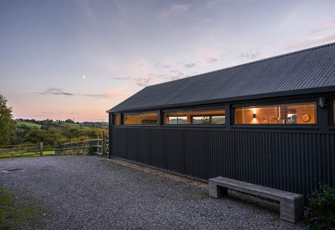 There is a private parking area for up to four cars just past the property to the left.