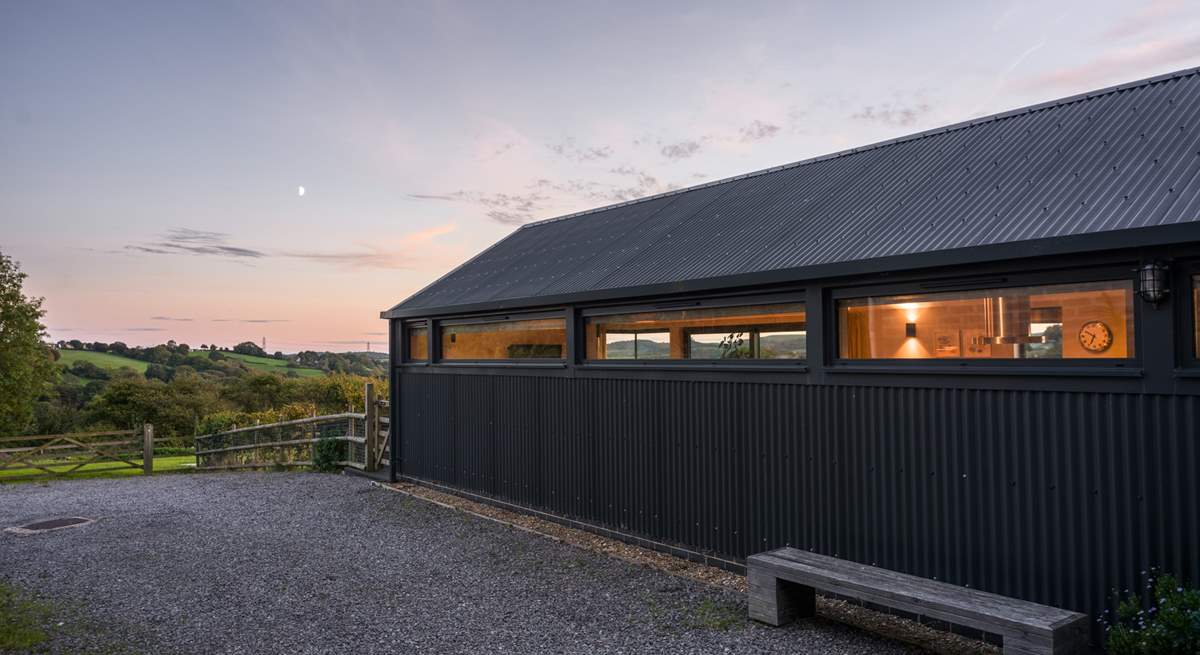 There is a private parking area for up to four cars just past the property to the left.