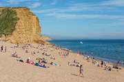 West Bay is fantastic for fossil hunting, sunbathing and a spot of crabbing off the quay.