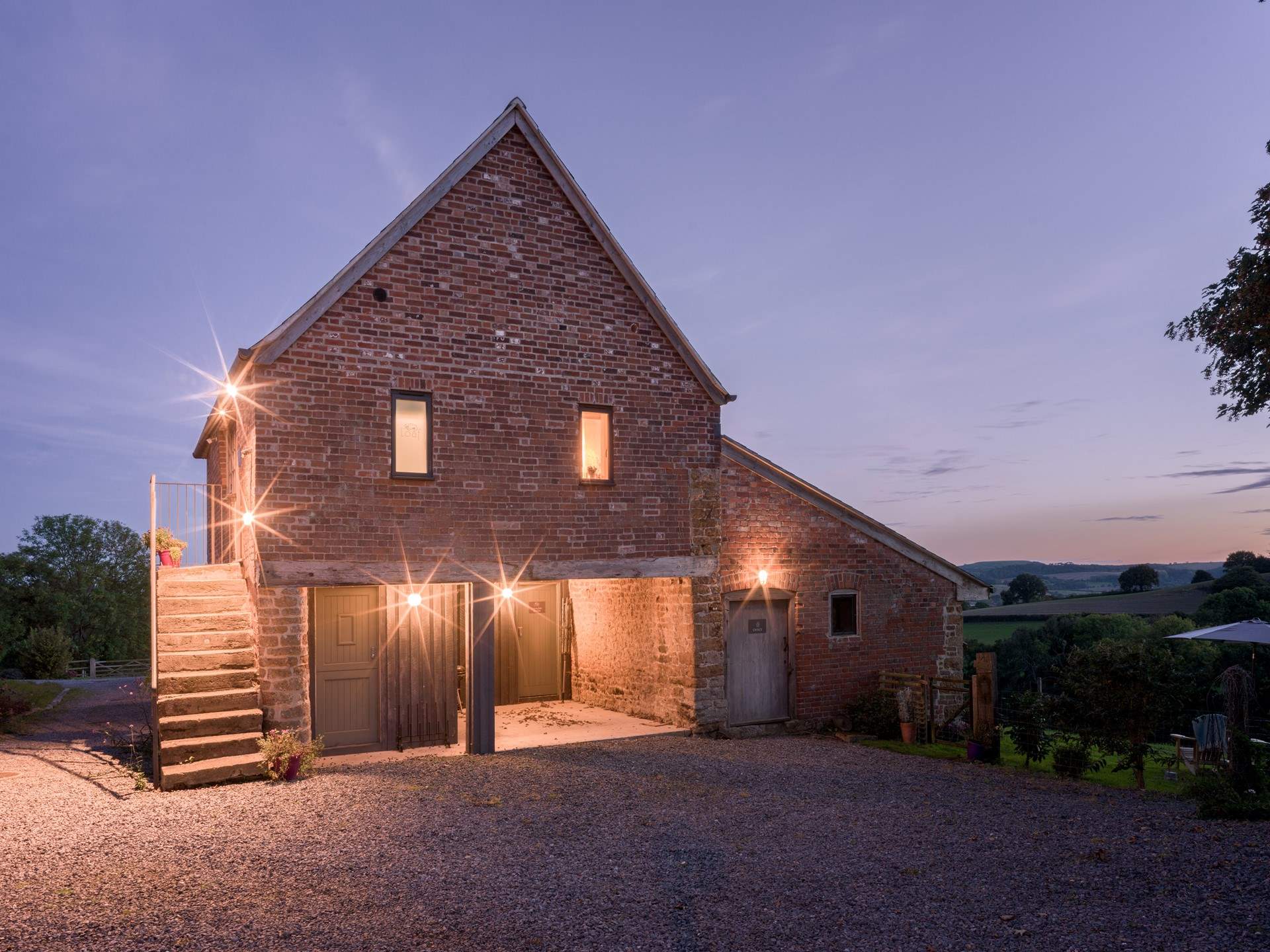 Under Loaf you will find the dedicated laundry with washing machine/drier. Note the external staircase up to the front door.