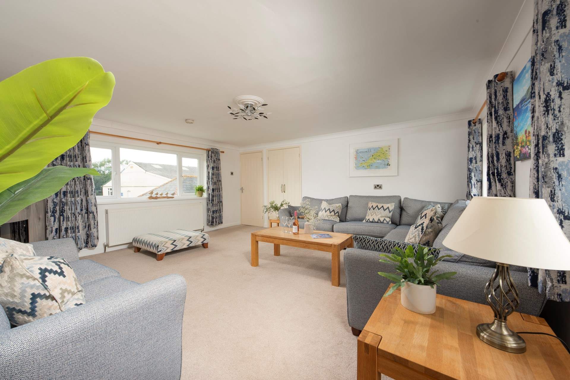 The modern and spacious sitting-room is on the first floor.