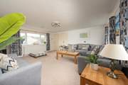 The modern and spacious sitting-room is on the first floor.