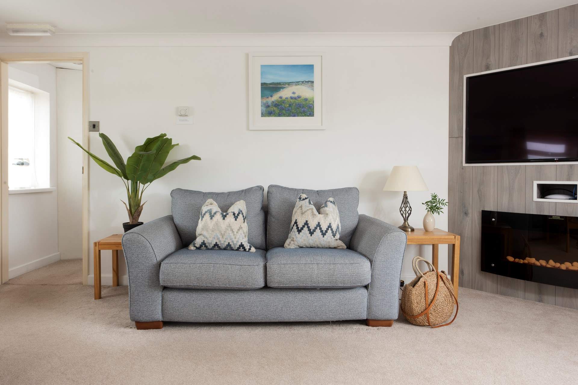 Cosy up next to the ornamental fireplace.